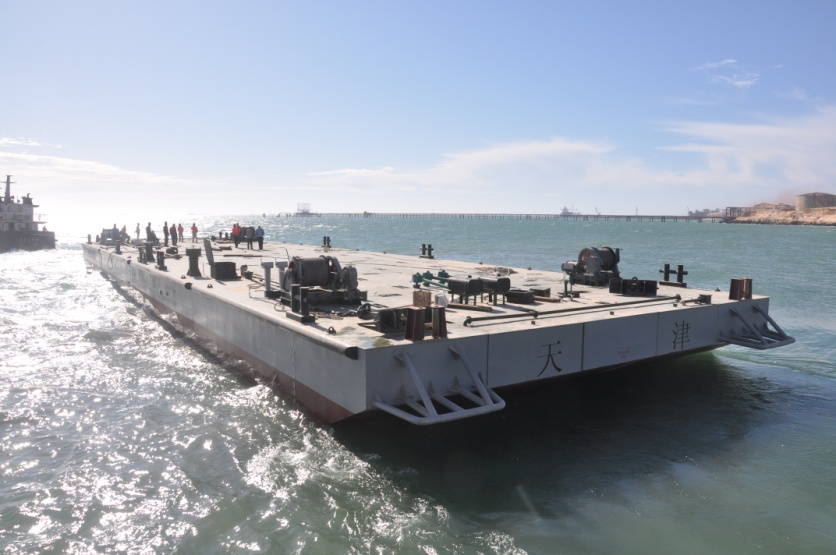 An assembled modular barge afloat